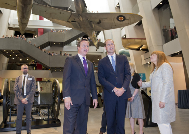 The Duke of Cambridge, David Cameron and Dianne Lees in the atrium of the museum
