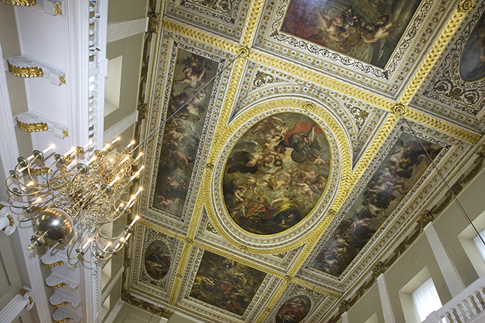 The canvases were painted by Sir Peter Paul Rubens and installed in the hall in 1636. The three main canvasses depict The Union of the Crowns, The Apotheosis of James I and The Peaceful Reign of James I. The only surviving in-situ ceiling painting of Peter Paul Rubens is also one of the most famous from a golden age of painting.Two canvasses measure 28x20ft and two others 40x10ft.The ceiling was one of Charles I’s last sights before he lost his head. The King was executed on a scaffold outside in 1649.