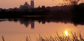 Ely Cathedral silhouetted at sunset. Credit: VisitBritain