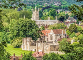 Distant view St. Cross in Winchester, Hampshire. Credit: travelbild/Alamy