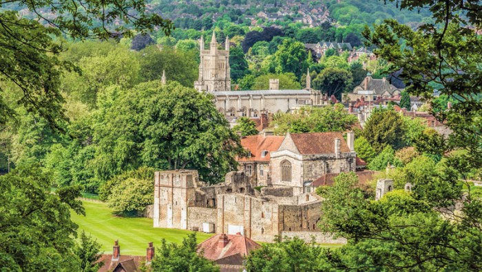 Distant view St. Cross in Winchester, Hampshire. Credit: travelbild/Alamy