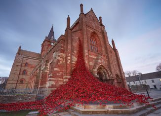 Poppies Weeping Window installation at St Magnus Cathedral, Orkney